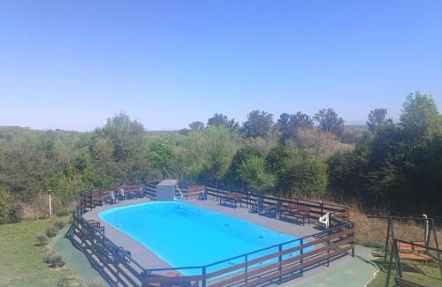 Santa Rosa de Calamuchita Apartment | Inviting Chalets de la Paix with Pool & Family-Friendly Vibes