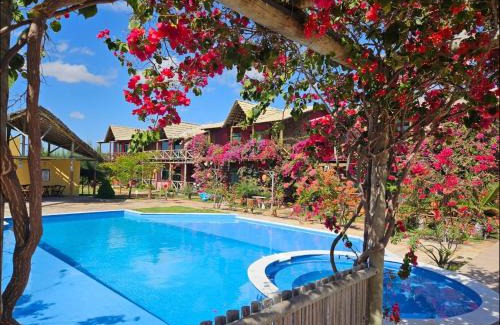 Coqueiro Apartment | ChaleVille: Family-Friendly Escape with Pool & 9.7 Rating
