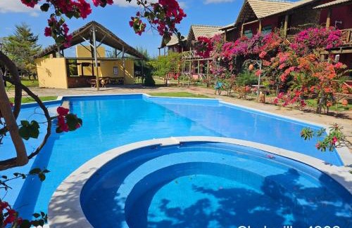 Coqueiro Apartment | ChaleVille: Family-Friendly Escape with Pool & 9.7 Rating