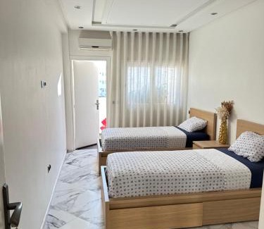 Agdal House | Perfect Family Stay: Rabat Agdal Room in Shared Apartment