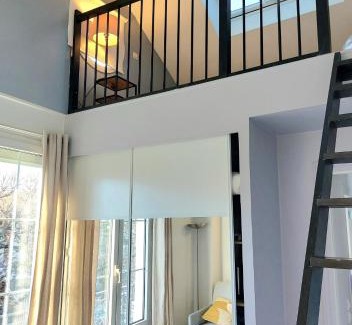 Rueil-Malmaison House | Inviting Mezzanine Room in an Artist's Home, Child Friendly