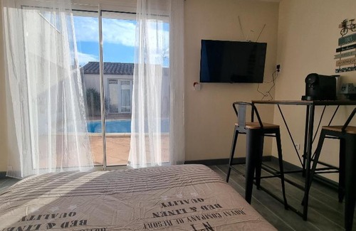Marcorignan House | Inviting Room with Shared Pool and Pet-Friendly Amenities