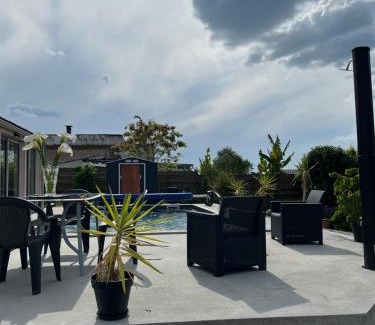 Yves Bed & Breakfast | Inviting Room with Pool and Marais View for Your Escape