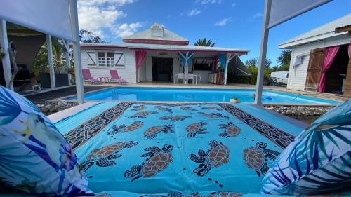 Le Moule Bed & Breakfast | Oceanfront Bliss at Au Bel'vue chez Sandrine - Rated 9.3/10