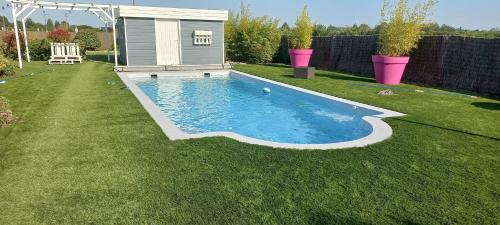 Veretz House | Independently Enjoy a Poolside Retreat with Breakfast Included