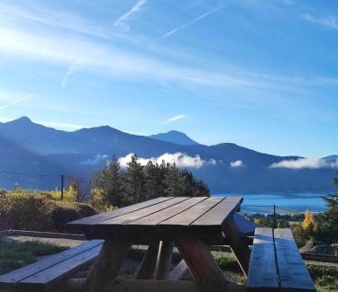 Prunieres Apartment | Scenic Lake View Room with Pool Access for Families