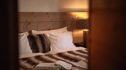 Champoussin Hotel | Discover Champoussin Lodge: Pool, Spa & Family Friendly