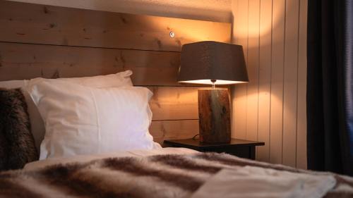 Champoussin Hotel | Discover Champoussin Lodge: Pool, Spa & Family Friendly
