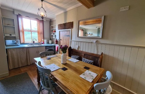 Wigton House | Chapel View Cottage: Oceanfront Escape with Pet-Friendly Joy