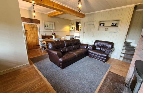 Wigton House | Chapel View Cottage: Oceanfront Escape with Pet-Friendly Joy