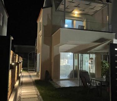 Nea Iraklitsa Apartment | Experience Oceanfront Bliss at Chara's House, Rated 9.3/10