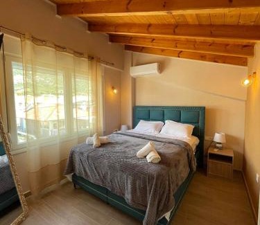 Nea Iraklitsa Apartment | Experience Oceanfront Bliss at Chara's House, Rated 9.3/10