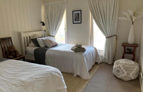 Lake Charm Bed & Breakfast | Discover Oceanfront Bliss at Charm Lodge - Rated 9.4/10