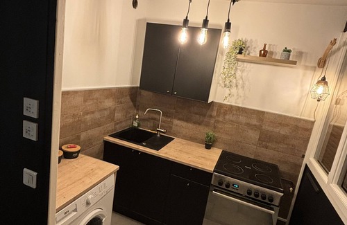 Paron Apartment | Inviting Studio Near the Train Station with Great Amenities