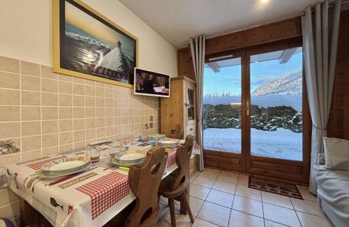 Praz-sur-Arly Apartment | Bright Apartment with Terrace and Mountain Views in Praz-sur-Arly