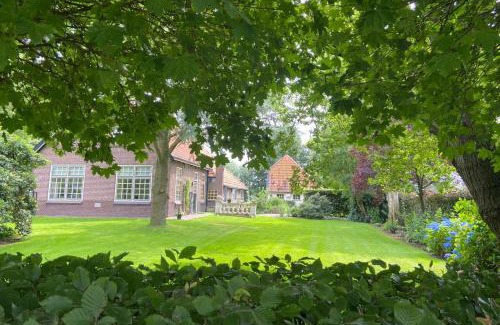 Zandhuizen Apartment | Enjoy Oceanfront Comfort at Charmantbuiten - Rated 9.1/10
