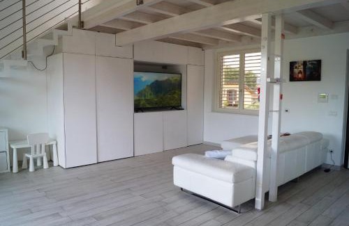 Ispra Apartment | Tranquil Lake Loft with Hot Tub & Oceanfront Bliss