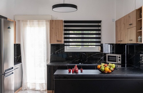 Roussospiti Villa | Inviting Villa with Pool, Hot Tub & Scenic Views Await