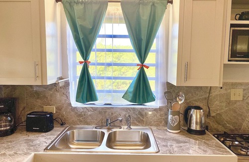 Fitches Creek House | Premier Comfort Suite with Spa and Family Amenities in Antigua
