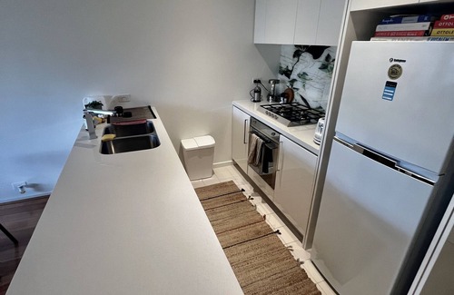 Fitzroy Apartment | Elegant 1BR Fitzroy Retreat with Pool, Gym & Parking