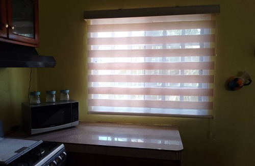 Xul-Ha House | Charming 2-bedroom house with WiFi, AC, Pet Friendly,piscina in welcoming Xul-Ha