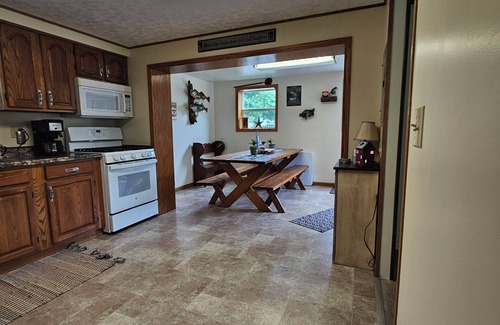 East Brady House | Charming 2-bedroom river house in East Brady with dock access.