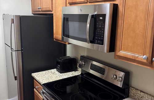 Lackey Condo | Charming 2-bedroom condo in marvelous Williamsburg with WiFi, fitness room