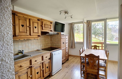 Reberty Apartment | Cozy Apartment Les Menuires with Spa & Family Amenities