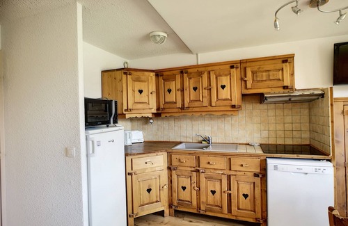 Reberty Apartment | Cozy Apartment Les Menuires with Spa & Family Amenities