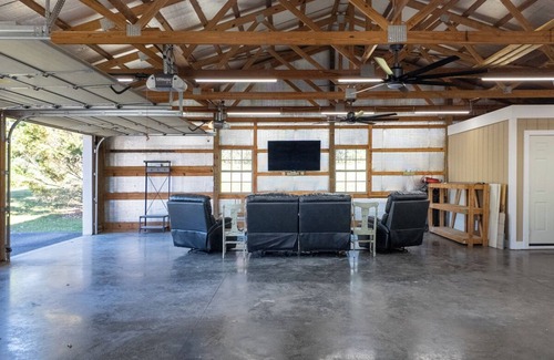 Bethpage House | Charming 3 bed, 2.5 bath farmhouse with hot tub, firepit, and seasonal pool!