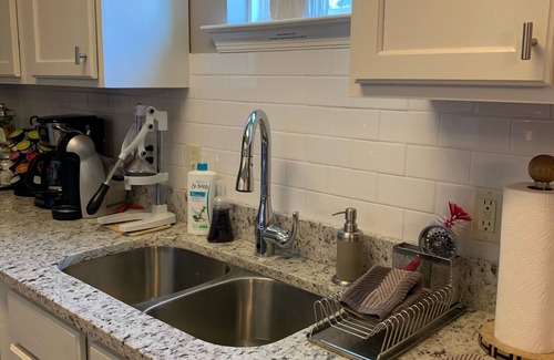 Uptown House | Inviting Uptown Cottage: 3 Bedrooms, Spa & Off-Street Parking