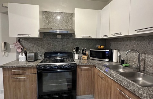Santo Domingo Oeste Apartment | Charming 3-bedroom apartment with WiFi, AC and a picuzzy in Santo Domingo Oeste.
