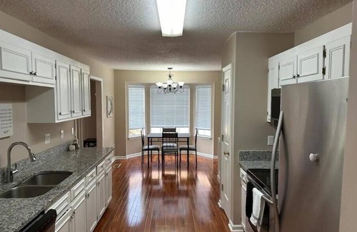 Knightdale House | Inviting 3-Bed Retreat with Spa & Breakfast Included