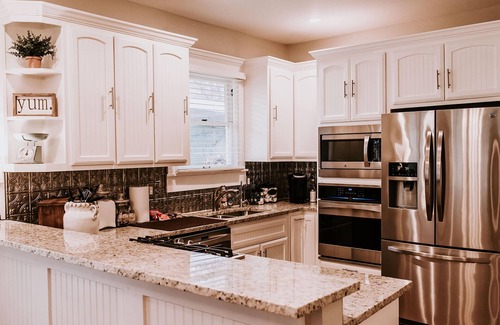 Southtown House | Discover Downtown Historic Home with Bonus Back House