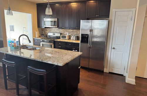 West Arlington House | Family-Friendly 4BR Duplex with Hot Tub & Top Reviews