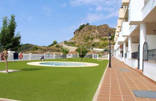 Almeria Apartment | Cozy 2-Bedroom Apartment with Pool and Garden at Enix Almeria