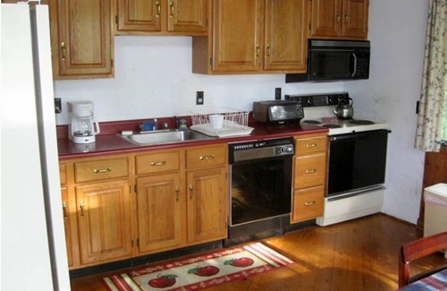 Paul Smiths Ski Chalet | Cozy Adirondack Cabin with Lake Views and Pet-Friendly Amenities