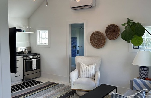 East Quogue Cottage | Welcoming Cottage with Salt Water Pool and Breakfast