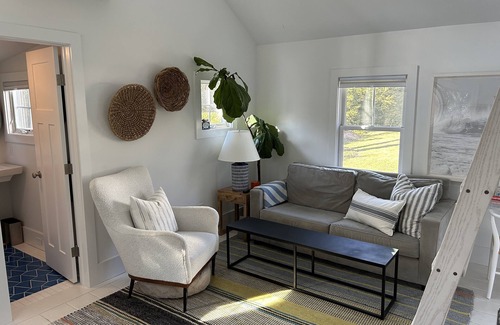 East Quogue Cottage | Welcoming Cottage with Salt Water Pool and Breakfast