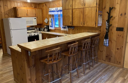 Lac du Flambeau Cottage | Cozy Fence Lake Cottage with Scenic Sunset Views