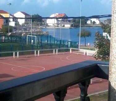 O Grove Apartment | Scenic Apartment in El Grove with Sea View and Family Focus