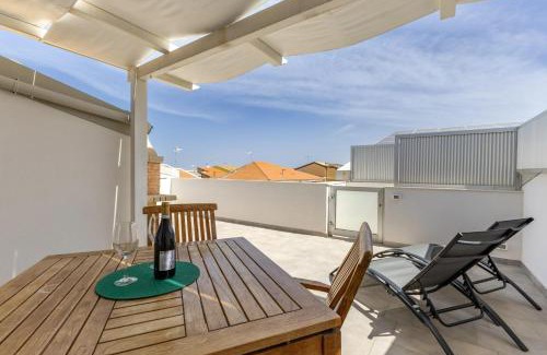 Punta Secca Apartment | Seaside Apartment in Punta Secca with Child-Friendly Perks