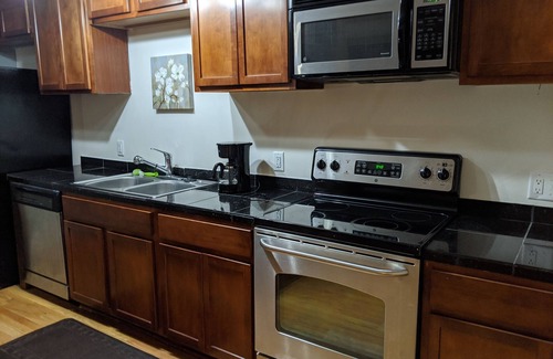Midtown Crossing Condo | Family-Friendly Apartment in Midtown Omaha with Kitchen