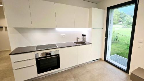 Sessa Apartment | Inviting Apartment with Garden & Convenient Parking