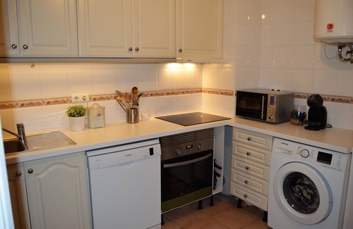 Meia Praia Apartment | Scenic Apartment with Rooftop Terrace Near Beach & Dining