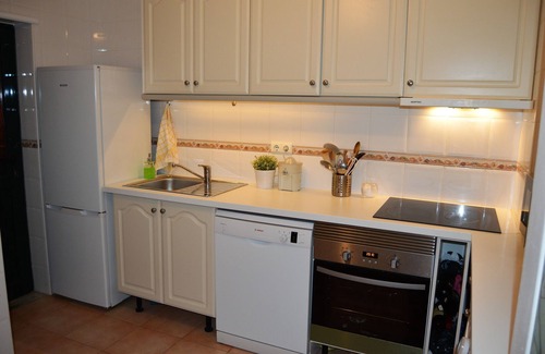 Meia Praia Apartment | Scenic Apartment with Rooftop Terrace Near Beach & Dining