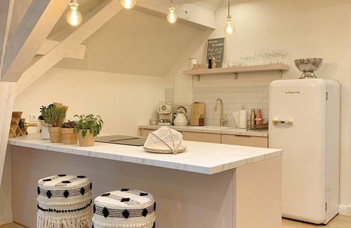 Sohland A. Rotstein Apartment | Boho Apartment Retreat with Spa & Hot Tub for Relaxation