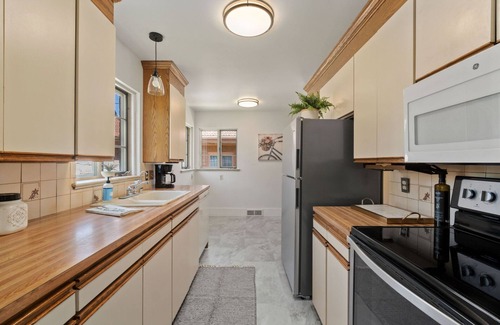 Cheyenne House | Beautiful Brick Home in The Avenues Near Frontier Park
