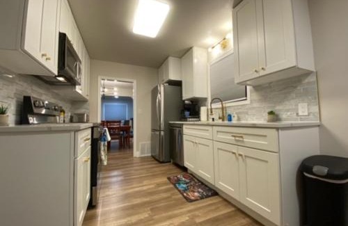 Logan House | Inviting Brick Home with Bonus Space & Foosball Fun