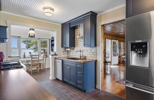 Cheboygan House | Guest Rated: 10/10 Burt Lake Cottage with Pool & Views